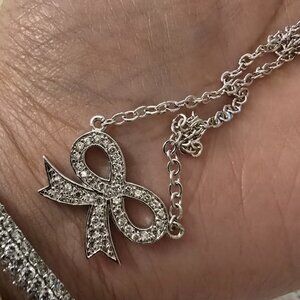 Solid sterling silver. 925 pave bow ribbon necklace